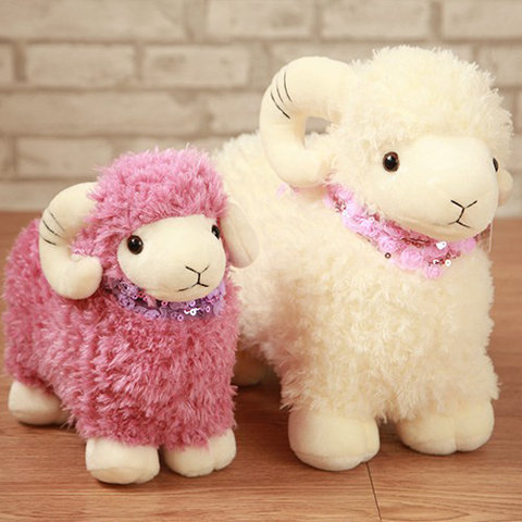 Plush sheep with cowbell
